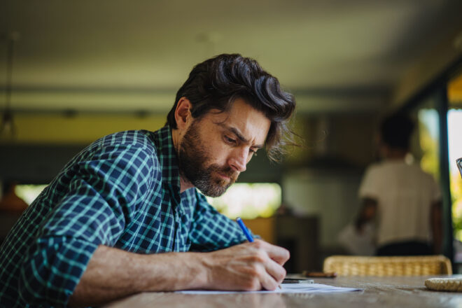 Man Writing Letter